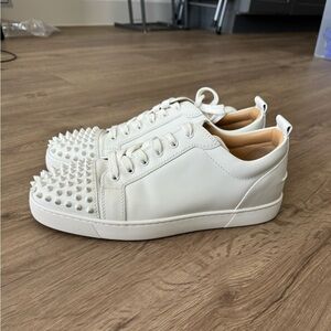 All white Christian Louboutin designer sneakers